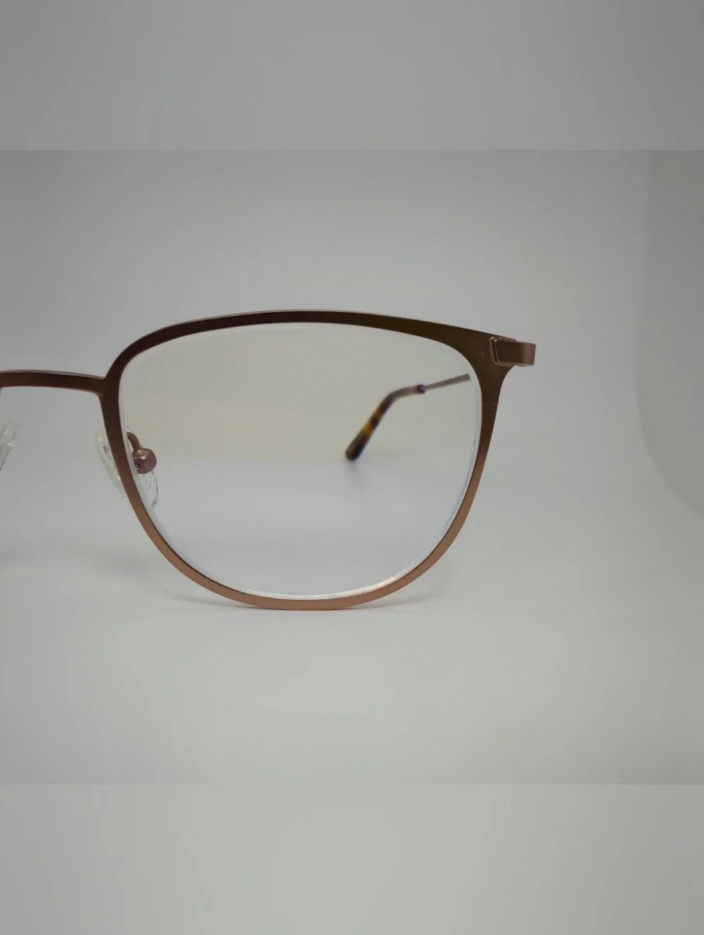 Vita. Metal Frame Eyeglasses in Copper Brown. Tortoise Temple Tips.